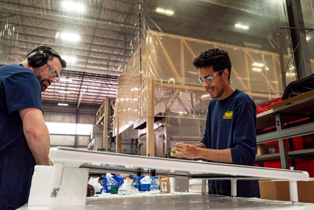 TMCO Assembly Team Members Working and Smiling.