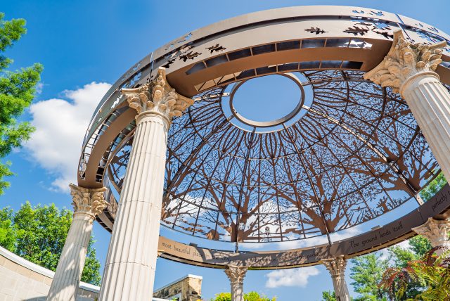 Metal Art Display at the Lincoln Children's Zoo. A close up of a dome top made out of etched metal in the design of trees.