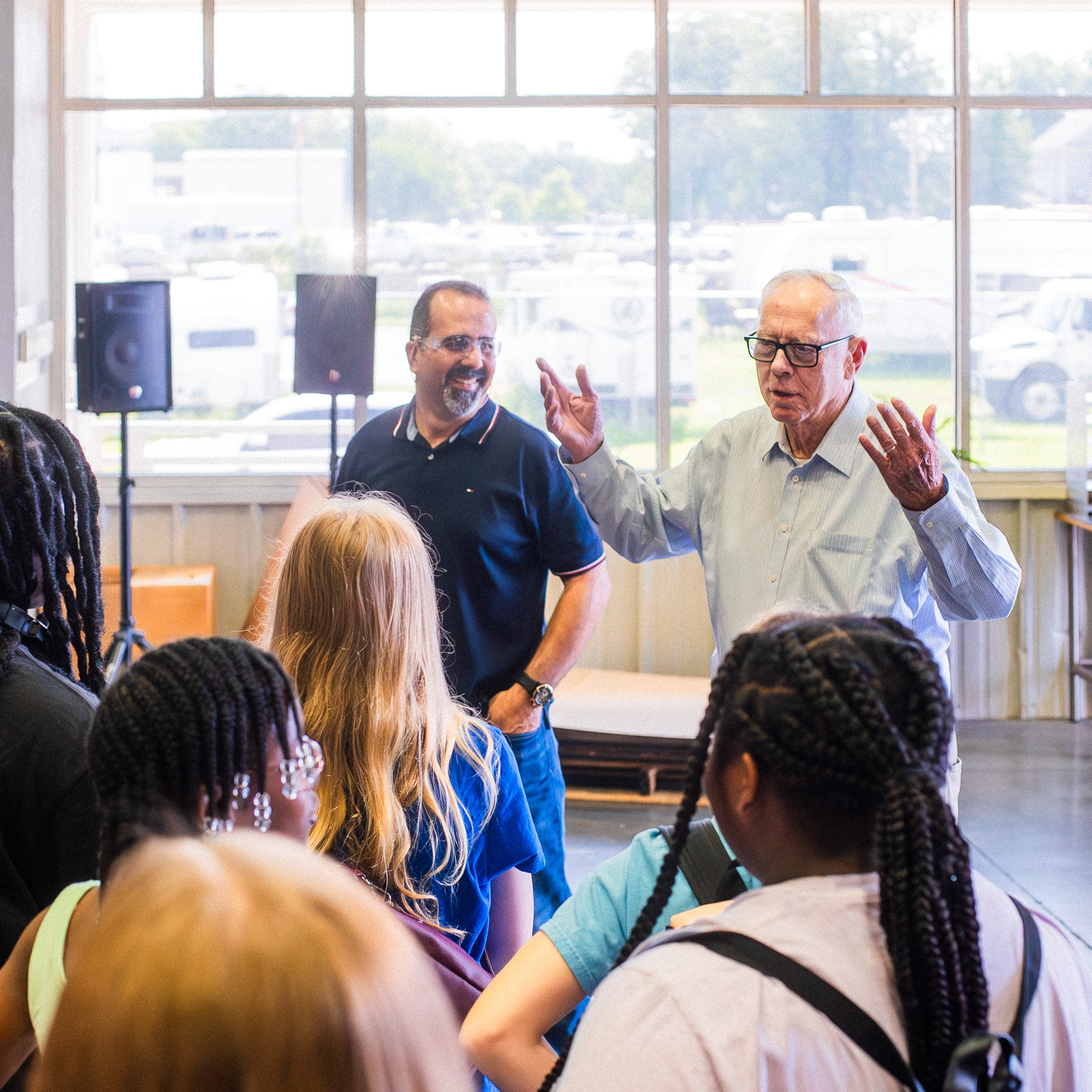 Chairman Roland Temme speaking to a group of students.
