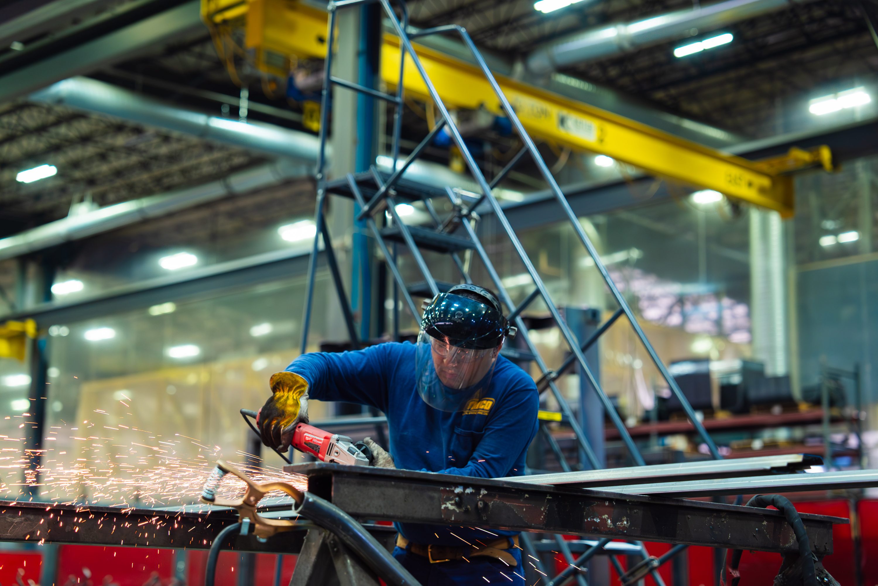 TMCO Total Manufacturing Welder doing metalwork.